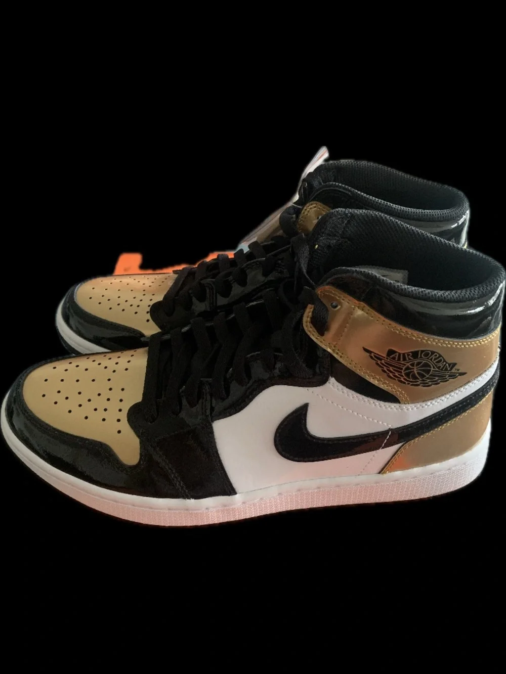 Jordan 1 High Sneakers in Black White Gold